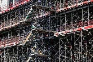 Steel scaffolding wrapped around a building under construction